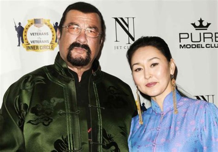 The Untold Story Of Steven Seagal's Controversial Wife